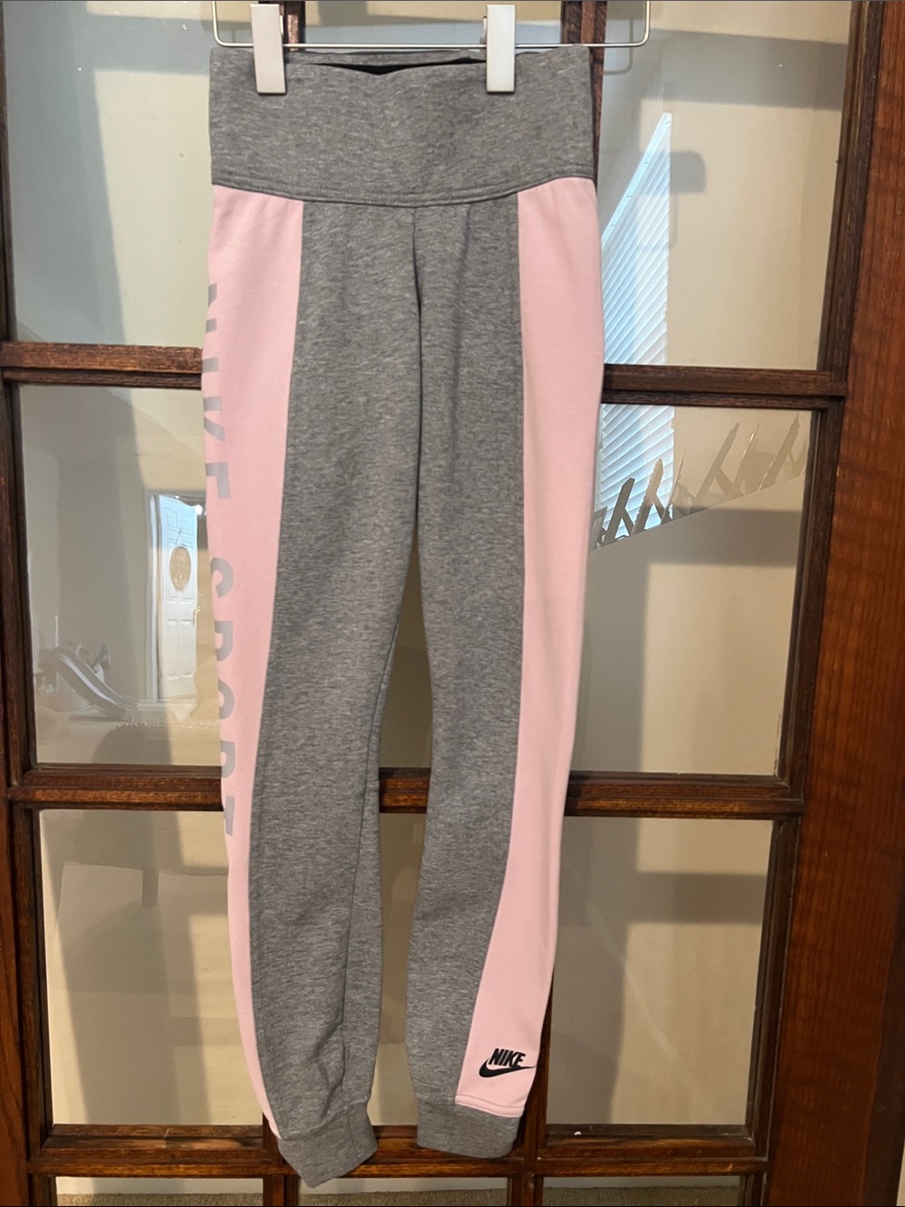 Never worn. Nike Grey and Light Pink Colorblock Kids Joggers